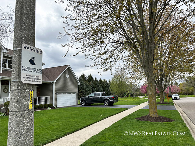 a neighborhood watch sign in Crystal Lake, IL
