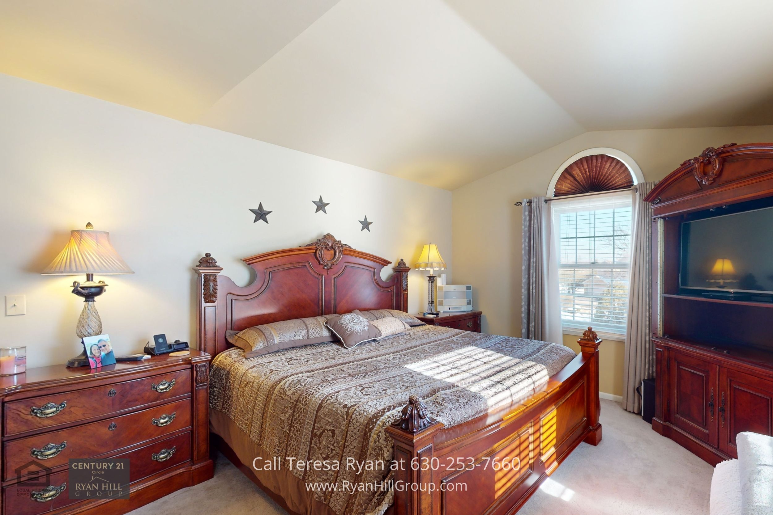 Home for sale in Winfield IL with a spacious primary bedroom complete with soft carpeting and large walk-in closets.