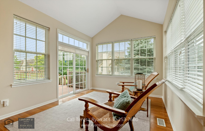 Experience the right blend of nature viewing and morning coffee in the sunroom area in Aurora