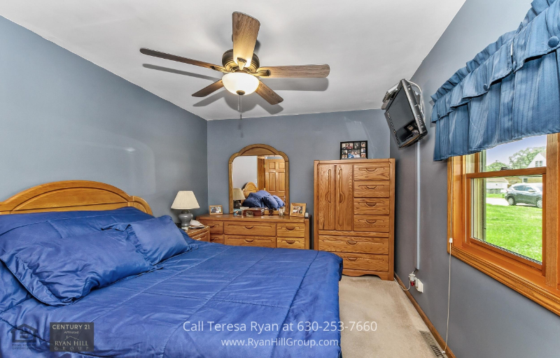 Wake up to serene mornings in the master bedroom of this Tinley Park IL home.