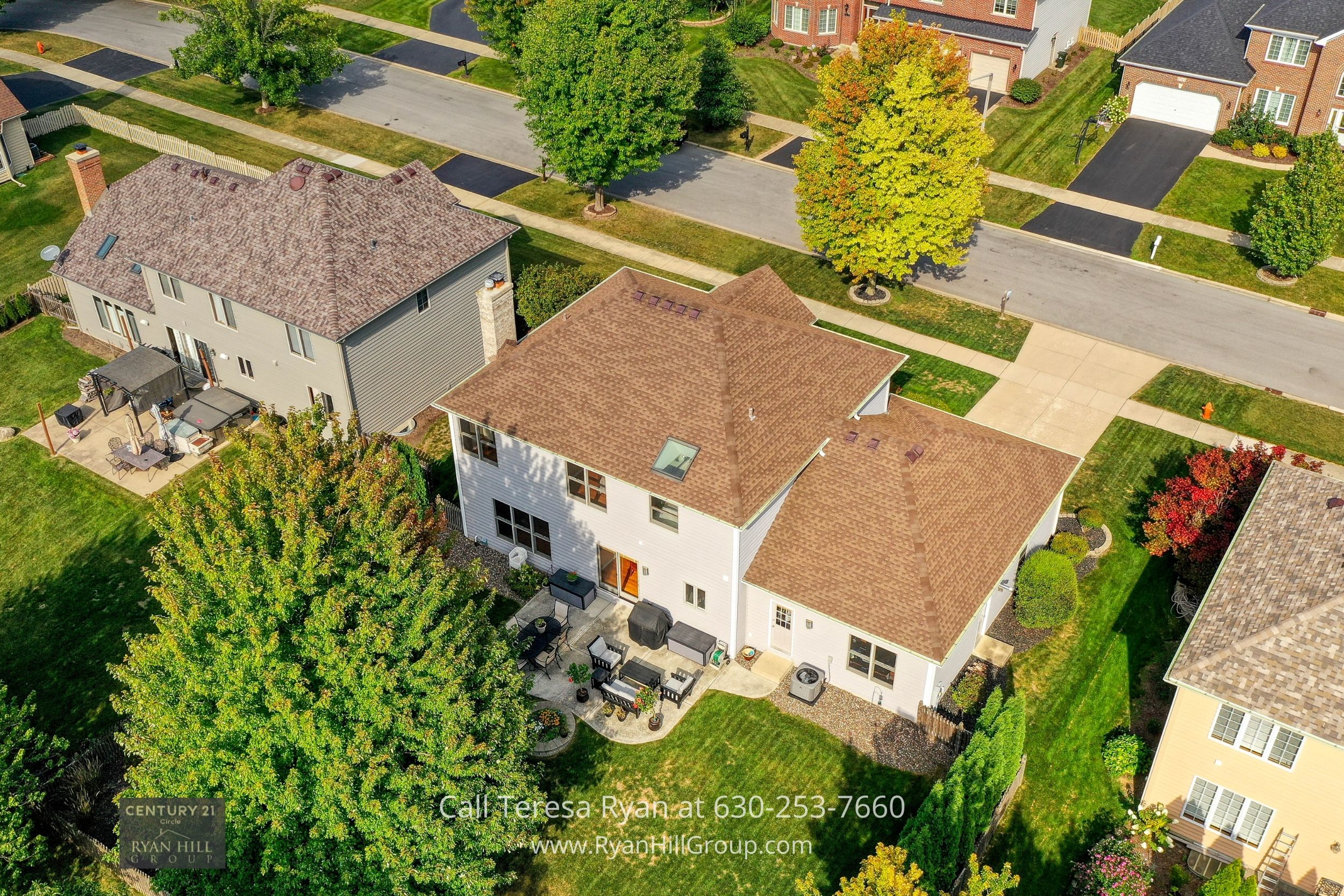 an aerial view of a home in a neighborhood