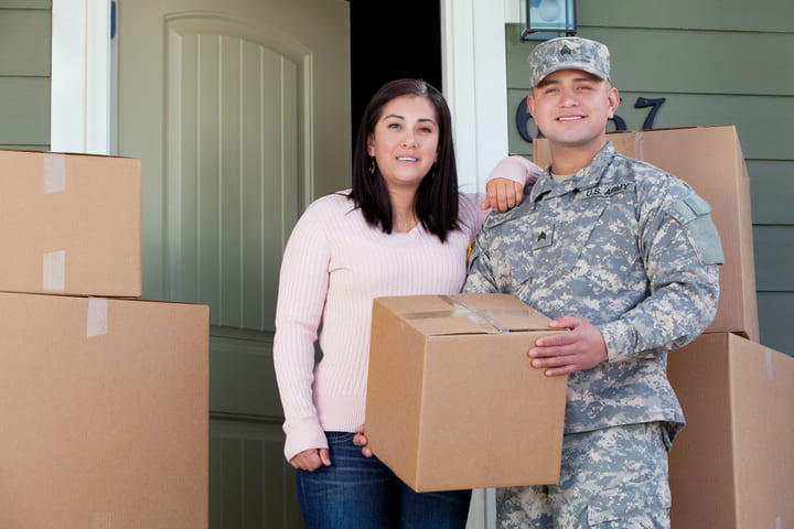 Military couple moving to a new home.