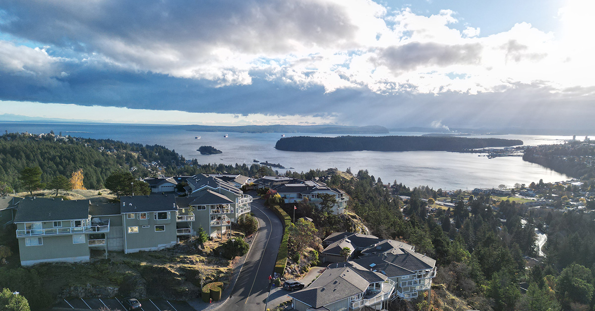 Oceanview townhomes overlooking Departure Bay at sunrise