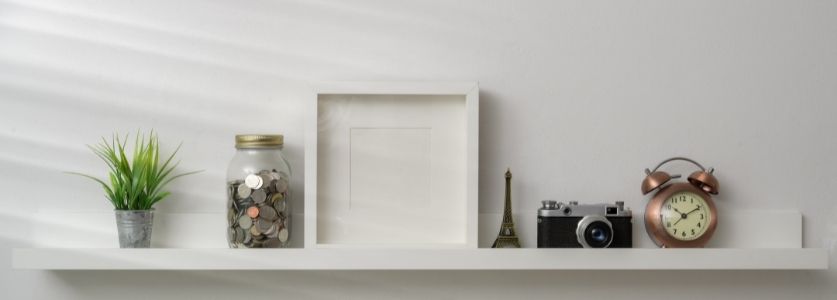 white floating shelf in condo