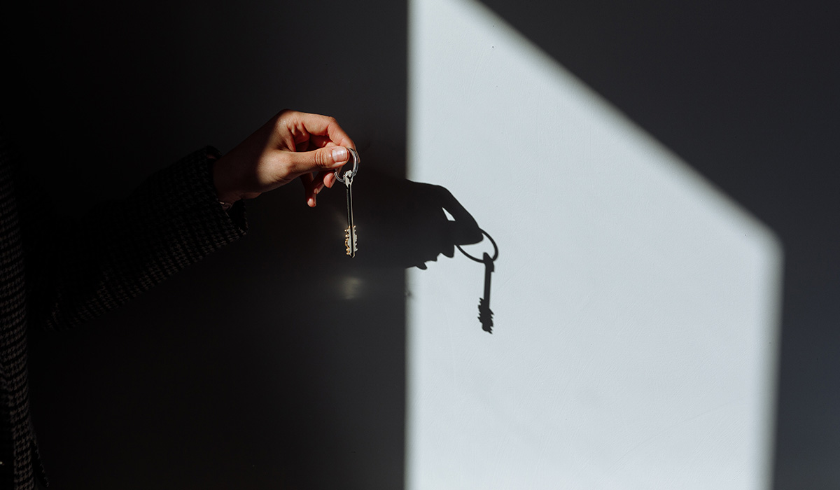 person holding keys