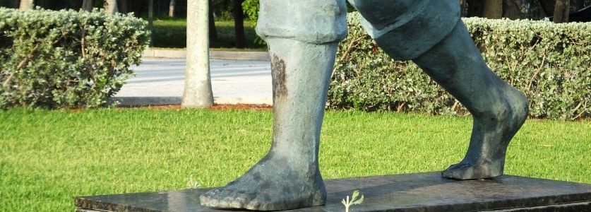barefoot mailman statue