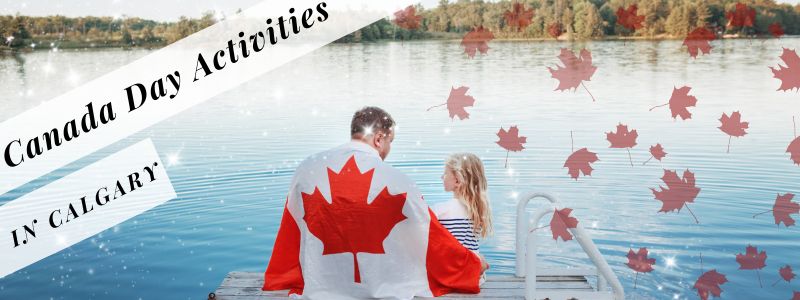 Father and Daughter sitting on a lake dock with a Canadian Flag Wrapped around them
