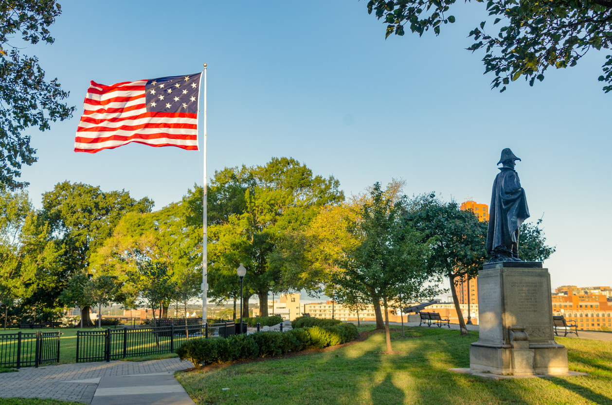 American Flag and Statue