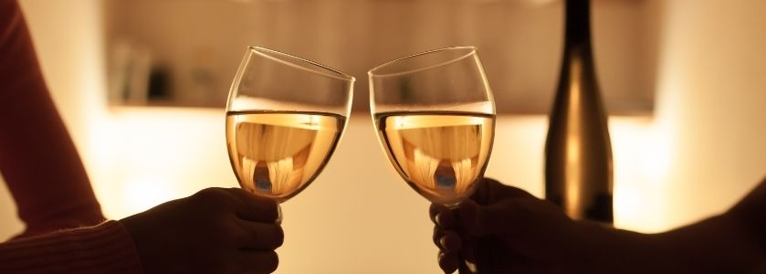 clanging chardonnay glasses on date night