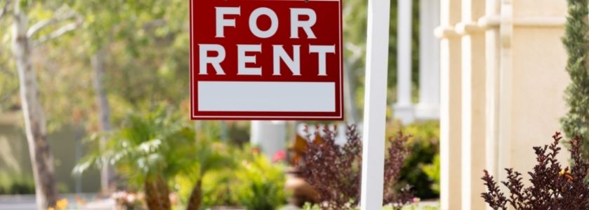 for rent sign in front of house