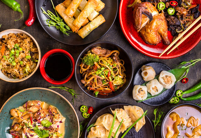 Chinese Food dishes arranged on table Chinese Food dishes arranged on table