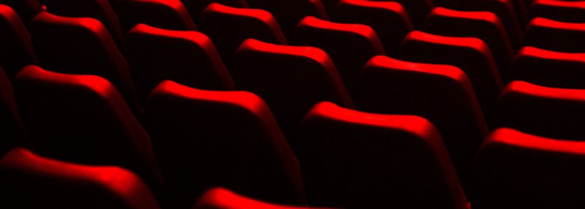 rows of velvet theater seats