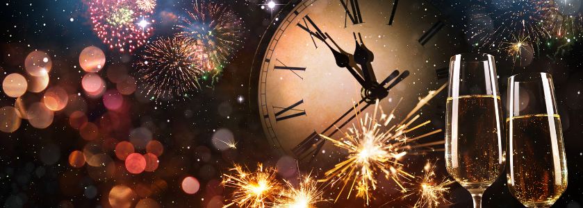 new years graphic with fireworks and a ticking clock