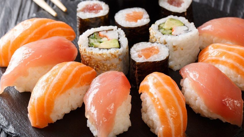 sushi salmon sushi arrangedon table