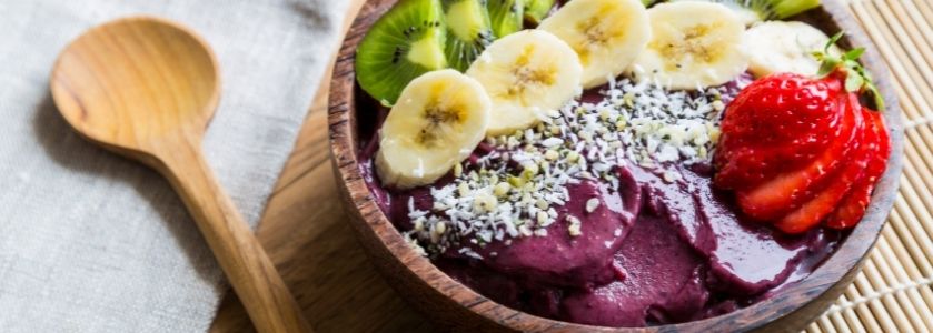 acai bowl with wooden spoon
