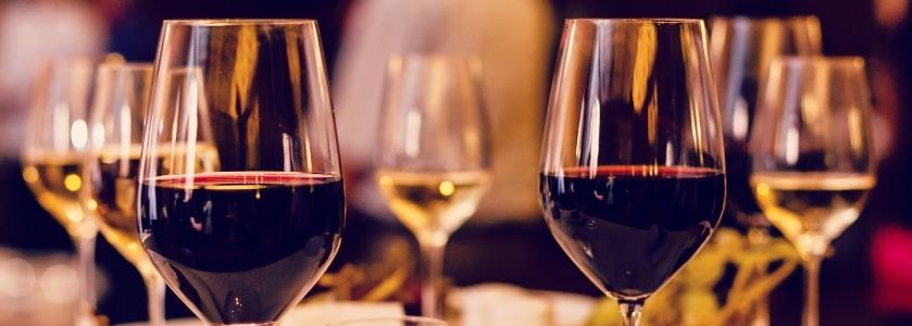 half filled wine glasses 