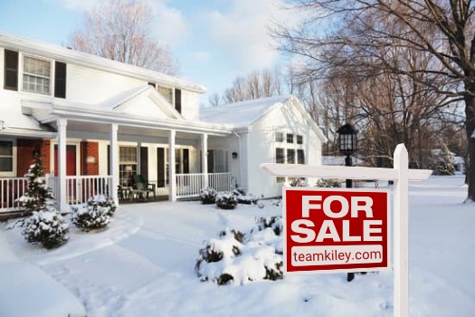 House For Sale Covered In Snow