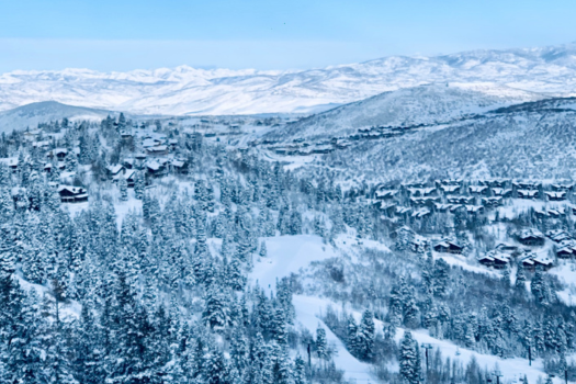 Image of Snowy Deer Valley with Luxury Homes in the background.