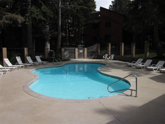Meadowridge condos pool in summer