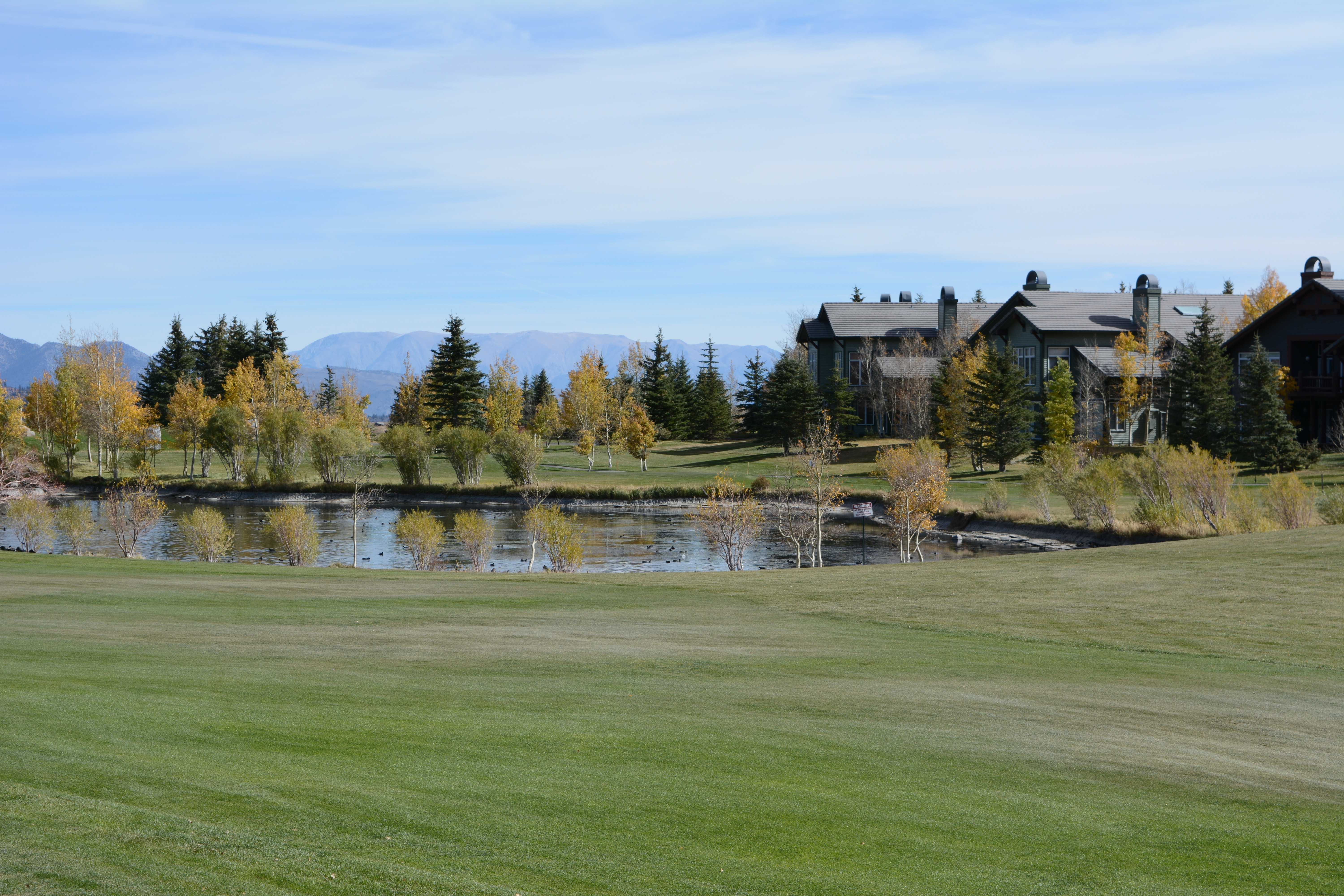 Snowcreek V Condos from golf course in summer