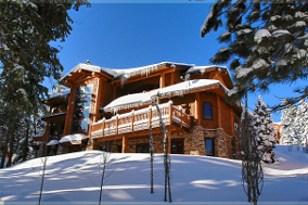 image of a home in a snowy hight location