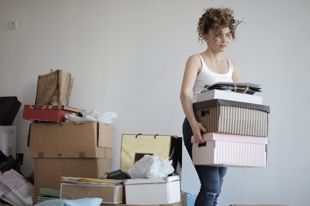 A woman decluttering her home
