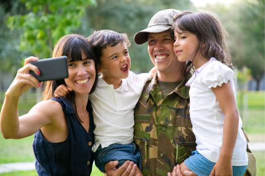 happy military family taking a selfie