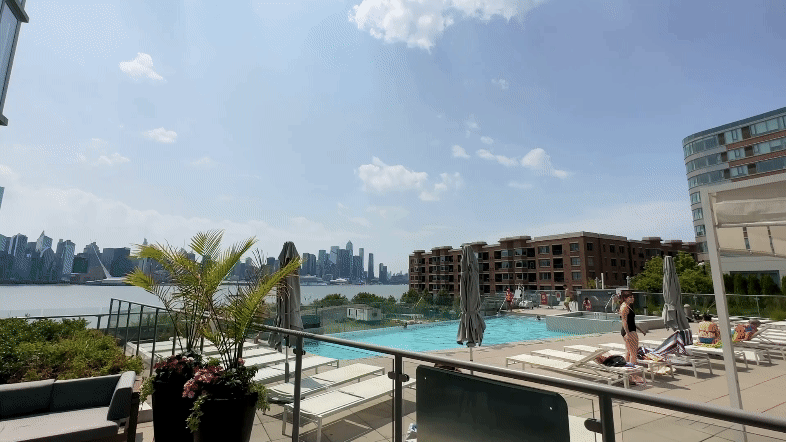 9 on the Hudson 9 Avenue At Port Imperial West New York NJ Michael Kotler Realtor exterior pool waterfront skyline view manhattan