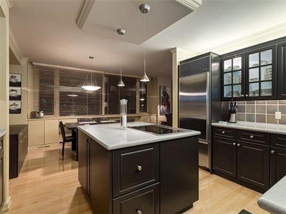 Kitchen & Dining Area in Eau Claire Estates Condos in Calgary, Alberta, Canada