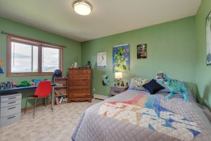 One of four bedrooms in this great single-family find. 