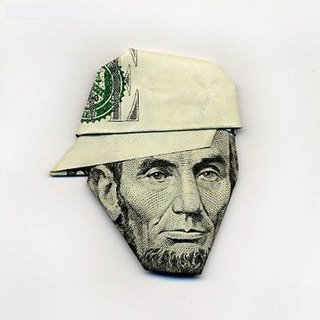 abe lincoln figure made of money