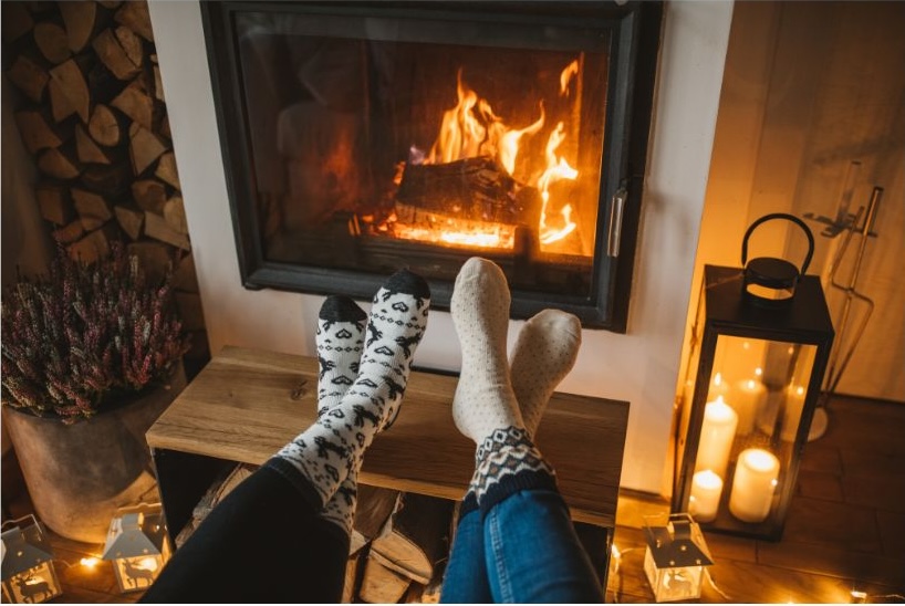 feet in front of fireplace