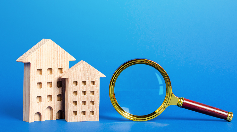 Wooden House Model with Magnifying Glass