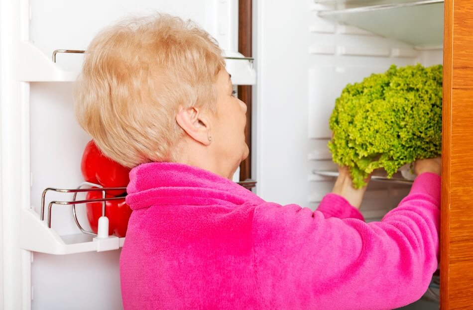 Senior Using Refrigerator