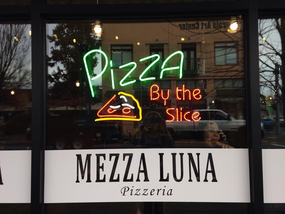 front window of Mezza Luna Pizzeria, Eugene Oregon