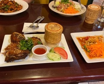 table of thai plates at chao pra ya in eugene oregon