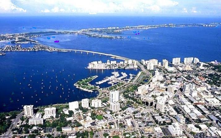 Ariel view of Sarasota - Image Credit: http://en.wikipedia.org/wiki/File:Sarasota_Florida_-_83d40m_-_from_mainland_across_bay_front_to_Gulf_of_Mexico_-_new_bridge.JPG