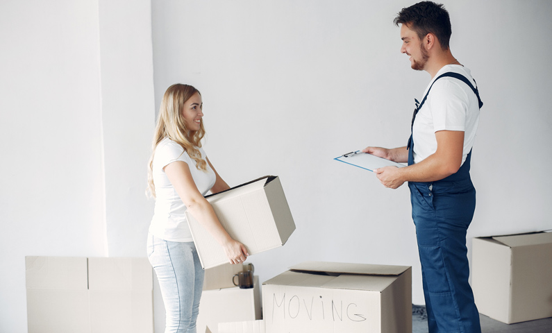 Woman moving and using boxes