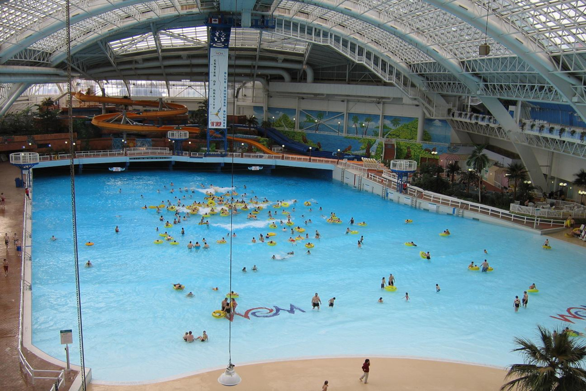 Children and adults enjoying in World Waterpark of West Edmonton.