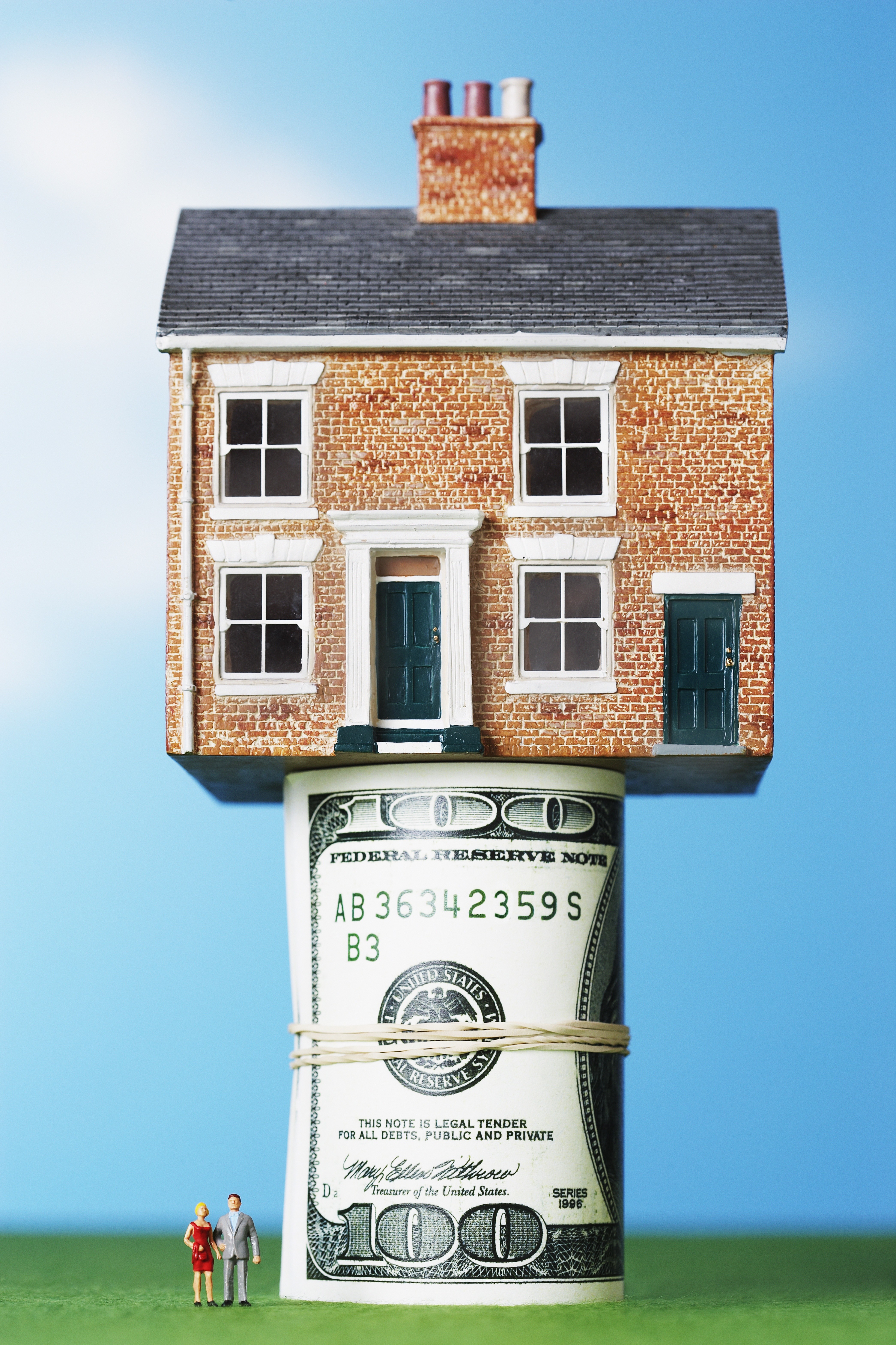 picture of house on top of money