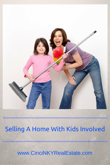 selling a home with kids involved picture of mother and daughter cleaning