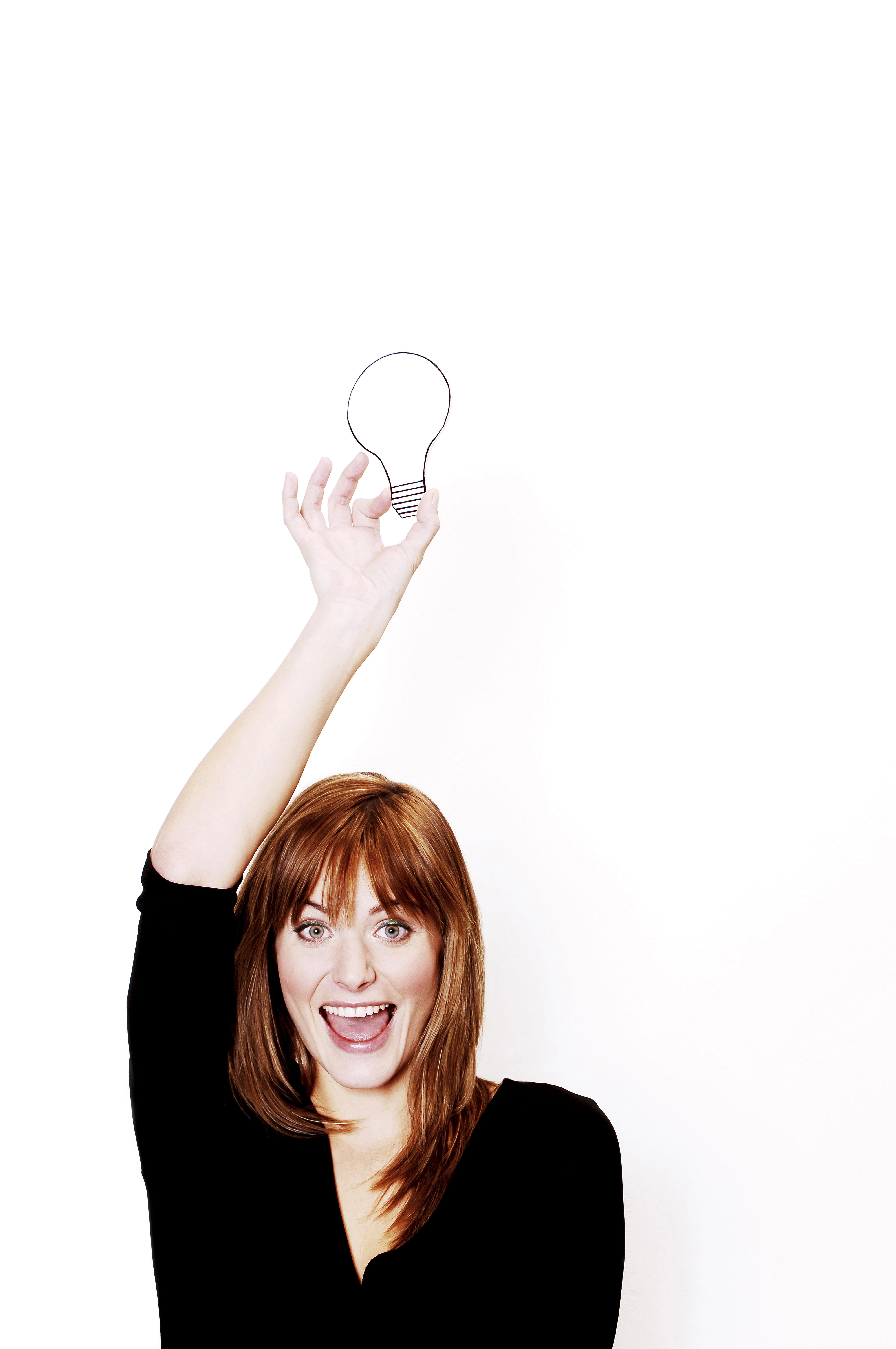 woman holding a bulb picture for smart home lighting article