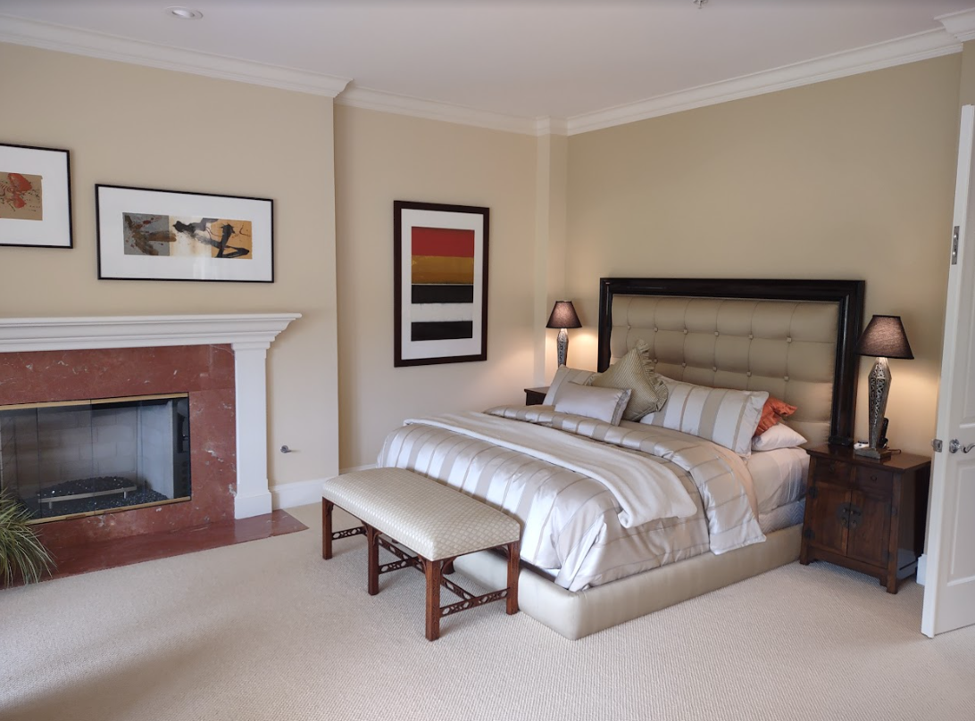 spanish_bay_homes_for_sale bedroom with fireplace