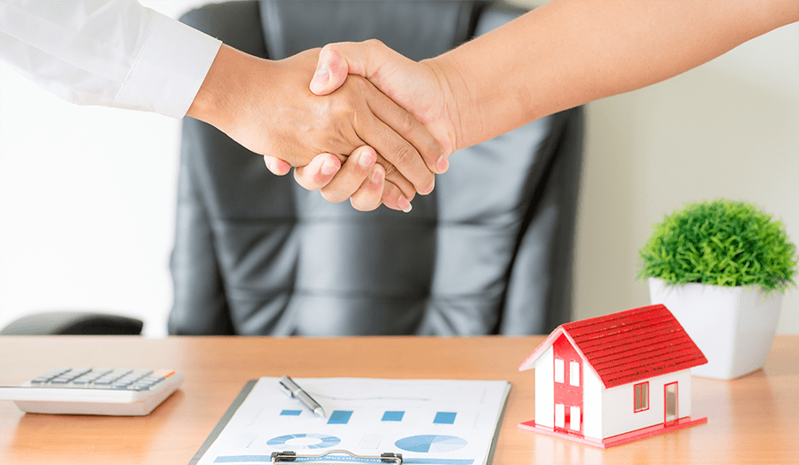 Four Essential Tips For Reducing Home Selling Stress Hand Shake Image