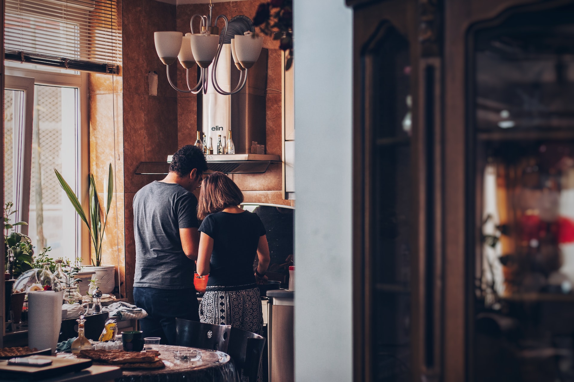 Navigating the Edmonton Real Estate Market as a First-Time Homebuyer Couple in Kitchen Image