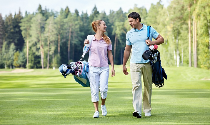 couple enjoying conversation and golf