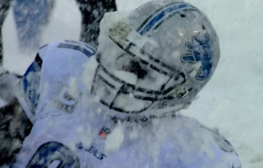 Calvin Johnson's face full of snow 