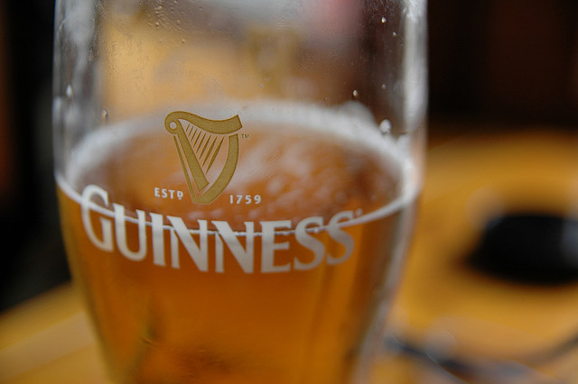 Light colored beer in a Guinness glass - Jeff Kubina