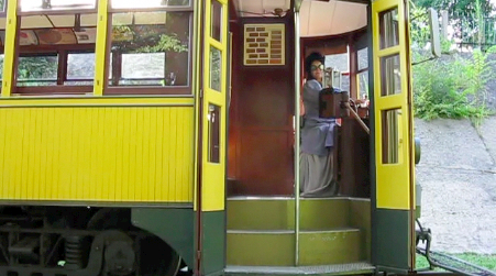 Alexandra Howes dressed in 1905 clothing aboard one of the streetcars. 