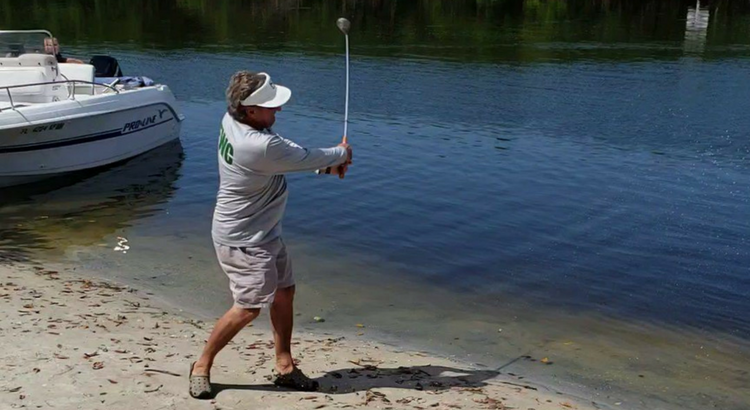 Guy wearing an FWC shirt hits golf balls at Dolphins?!?!